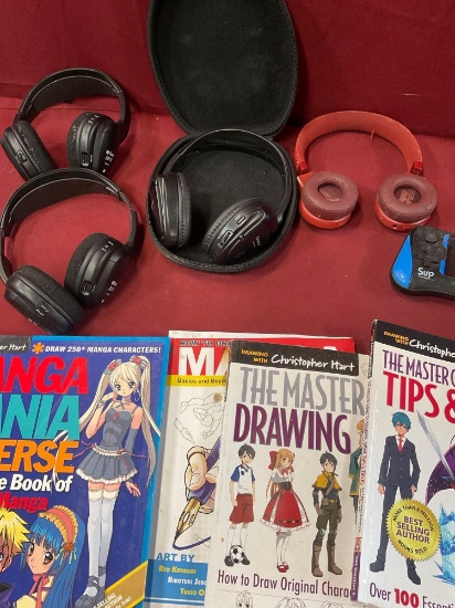 Assorted drawing Manga & Anime books, head sets, Sup game. Untested. 9 pieces