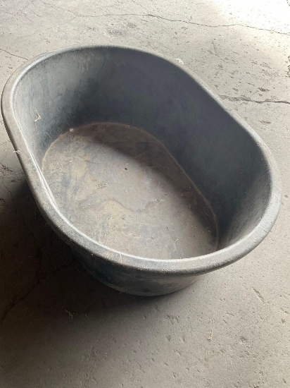 Tuff Staff 30 gallon oval water/ feeder container. Measurement 12" x 35" x 25"