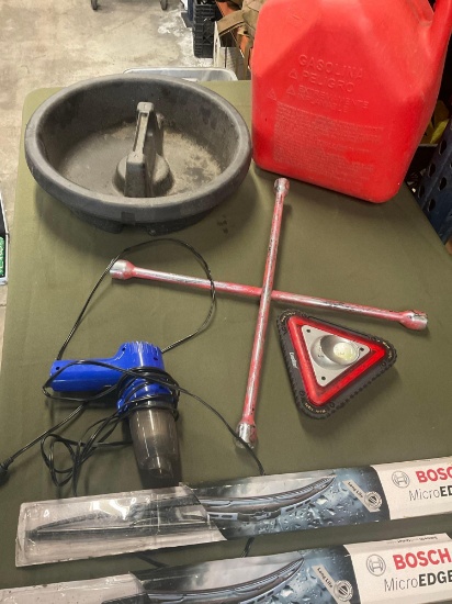 5 gallon gasoline container, tray, wrench, light, vacuum, windshield wipers. 7 pieces