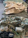 Duffle bag, shoes, 3) hats, canteen, 4) pants, 2) shirts, sweater. 13 pieces