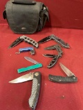Bag and assorted foldable knives. 8 pieces