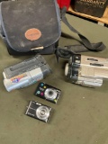 Untested no cords. Sony & Samsung video cameras & bag, Vivitar & Casio cameras. 4 pieces