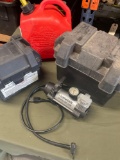 2 gallon gasoline containers, battery boxes, Husky inflator turned on. 4 pieces