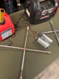 Power-station turned on, 2 gallon gasoline container, wrenches, Cobra inverter