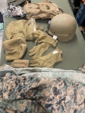 Helmet, pouches, hats, gloves, small and medium shirts. 11 pieces
