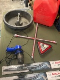 5 gallon gasoline container, tray, wrench, light, vacuum, windshield wipers. 7 pieces
