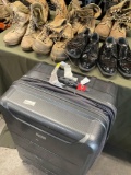Samsonite rolling luggage and assorted boots & shoes. 7 pairs
