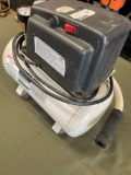 Pulsar 2 gallon 1/3 HP oil less air compressor, turned on