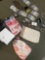 Assorted costume jewelry, jewelry bags, wallets, lighters. 21 pieces