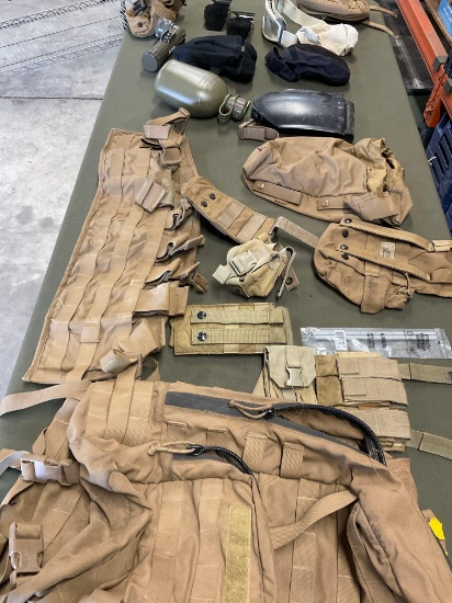 Backpack m assorted pouches, canteen, flashlight, goggles with extra lenses and pouch, etc. 16