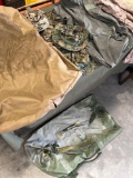 50 long flyers coveralls, duffel bag, 2 shirts, 5 hats, pant