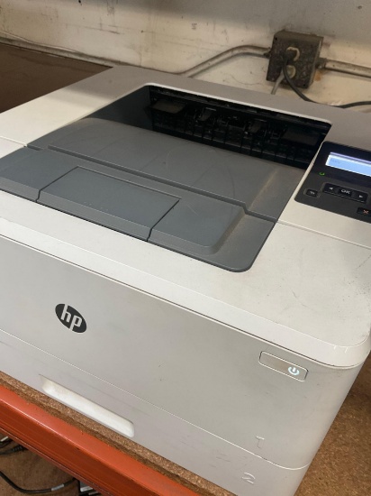 HP Laser Jet Pro M402n printer, turned on