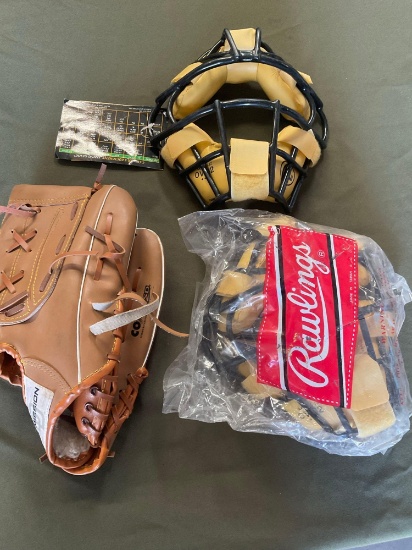 2) New Rawlings catchers masks 1) left hand glove