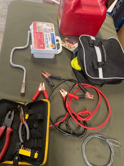 2 gallon gasoline container, first aid kit, wrench, tools, etc.