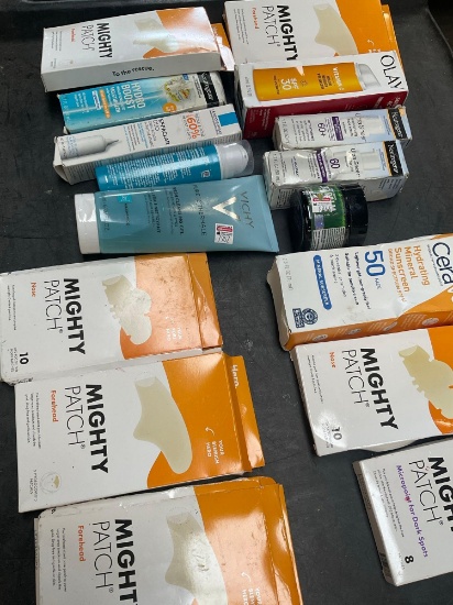 Olay, Neutrogena, CeraVe, Mighty Patch Assorted product. Damaged packaging, exp 2026-2027. 16 pieces