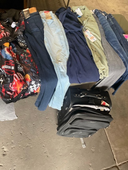 New, assorted clothing with tags, see pics for sizes & used Jaguar rolling luggage case. 10 pieces
