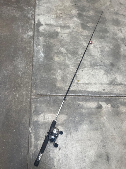 Black, Zebco 33 Authentic fishing pole with reel
