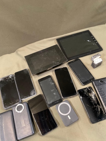 Untested no cords, charger stations, cell phones, ear buds, etc. 14 pieces