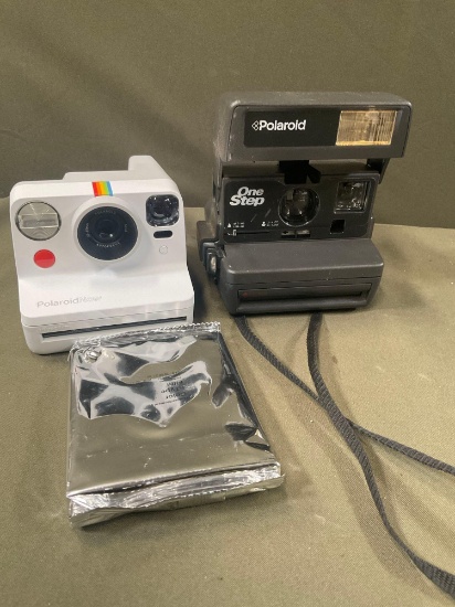 Polaroid Now with cord like new turned on & untested Polaroid One Step cameras