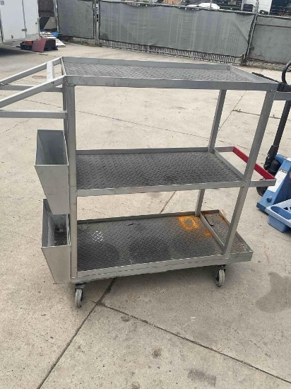 Three tier, stainless steel, rolling heavy duty utility cart. 4' x 54" x 18"