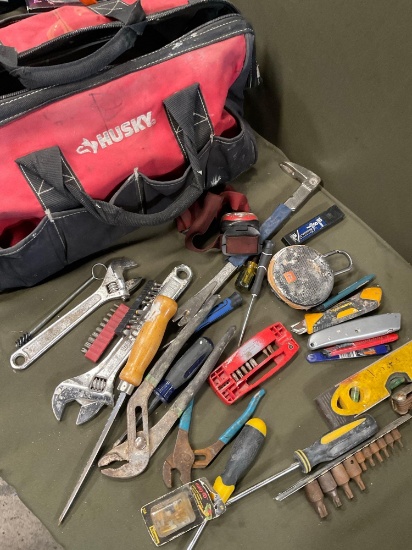 Husky 7 pouch tool bag and assorted tools.