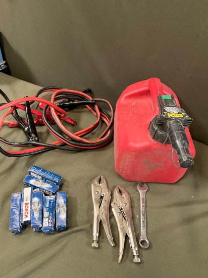 Bosch spark plugs, gasoline container, tools, jumper cables. 12 pieces
