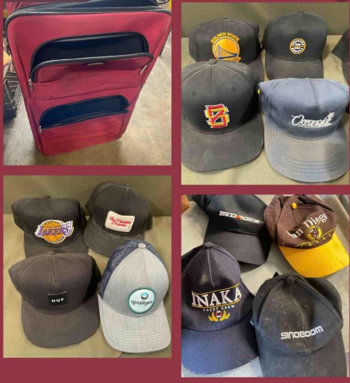 Used. Rolling luggage and assorted hats. 23 hats
