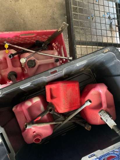 5) assorted gasoline containers 4 lug wrenches, Yakima hitch, etc