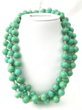 Vintage knotted Peking glass green bead necklace