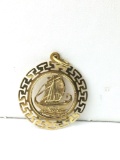 10K yellow gold ship medallion/charm