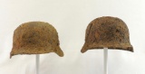 Group of 2 WW2 German Battle Dug Helmets