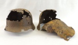 Group of 2 WW2 German Battle Dug Helmets