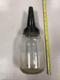 Unmarked vintage oil bottle with spout