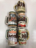 Lot of five Budweiser holiday steins