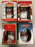 Lot of four Budweiser holiday steins