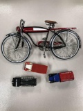 Lot of diecast metal bike and toy trucks