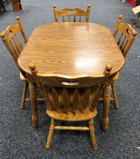 Contemporary oak table with four chairs
