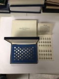 The Franklin mint states of the union sterling silver mini coin sets