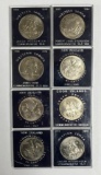 Group of eight commemorative dollars featuring New Zealand and others