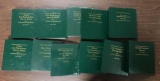 Group of 11 empty coin books