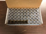 Box of empty dollar coin tubes