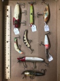 Box lot of eight vintage wooden fishing Lures