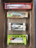 Box lot of four vintage Lures in boxes