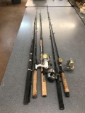 Lot of five Fishing rods and three reels