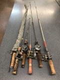 Lot of vintage fishing rods and reels