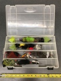 Plano tackle box with assortment of spinner baits