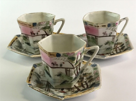 Group of three Japan cups and saucers