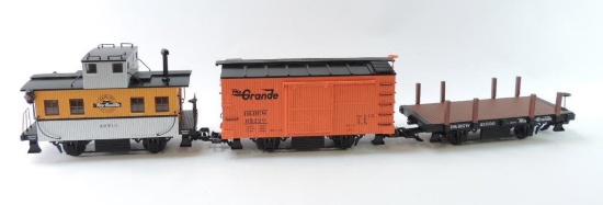 Group Of 3 Denver & Rio Grande Western G-Scale Caboose, Cargo, And Flat Bed Cars