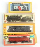 Group of 4 HO Scale Locomotives and Caboose with Original Boxes