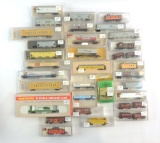 Group of 32 N Scale Train Cars with Original Cases